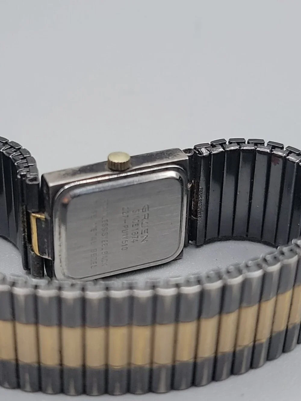 Vintage Gruen 227-PUW510 Two-Tone Rectangular Tank Watch Black & Gold Dial 17mm
